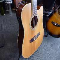 <p>Very playable electro-acoustic 12 string with solid spruce top, Fishman system, and cutaway.</p><p>Condition: One of the tuners has been replaced (as seen in pics), various smalls marks.</p>