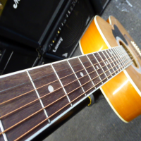 Decent entry-level acoustic guitar in good condition.